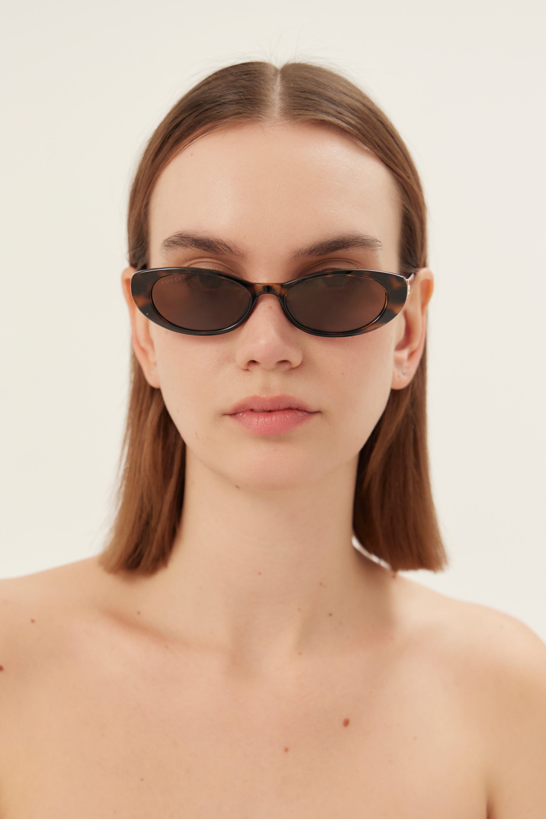 PRE-ORDINE - Occhiali da sole Gucci ovali cat-eye color havana con logo dorato